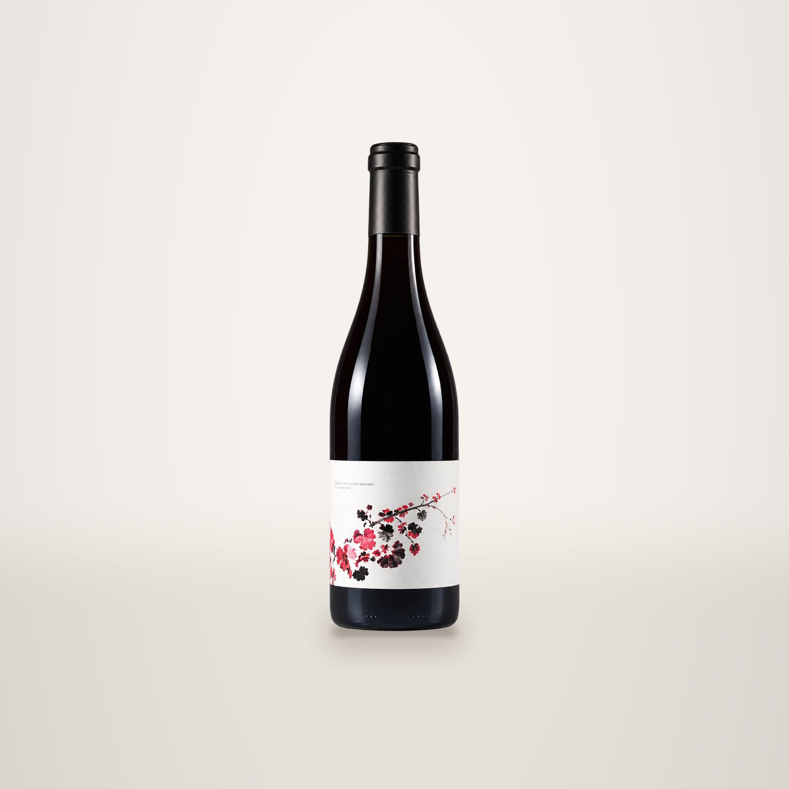 Bottle of Tramontane Grenache Noir red wine, white label with red and purple leaves.